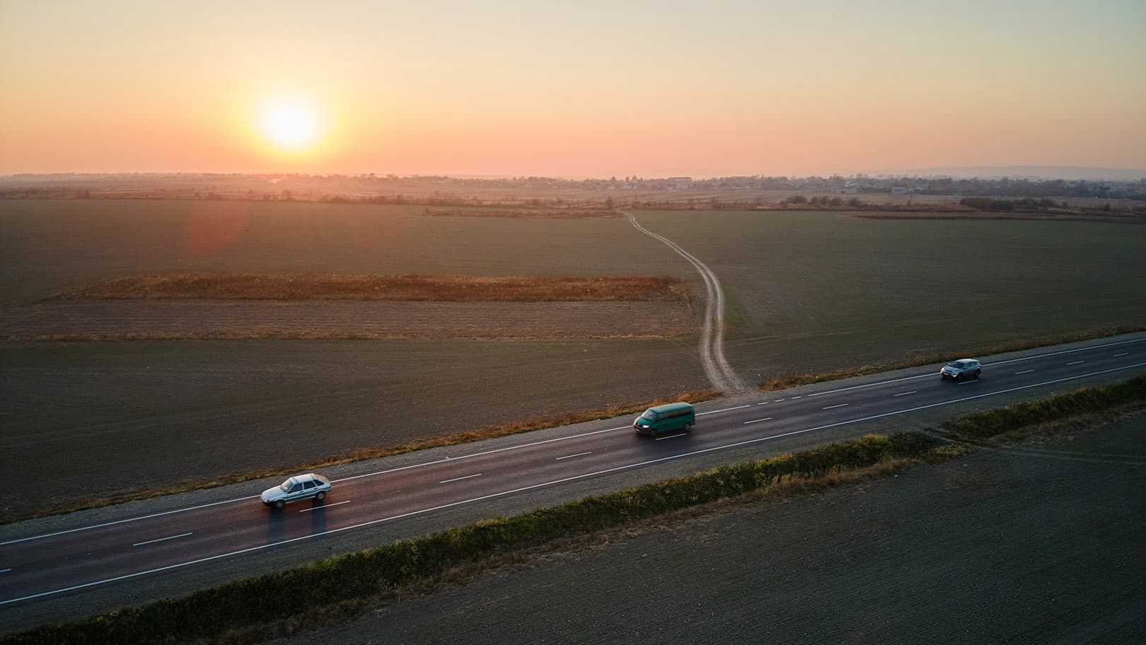 aerial-view-of-intercity-road-with-fast-driving-ca-2024-12-06-02-45-33-utc-16-9 aerial-view-of-intercity-road-with-fast-driving-ca-2024-12-06-02-45-33-utc-16-9