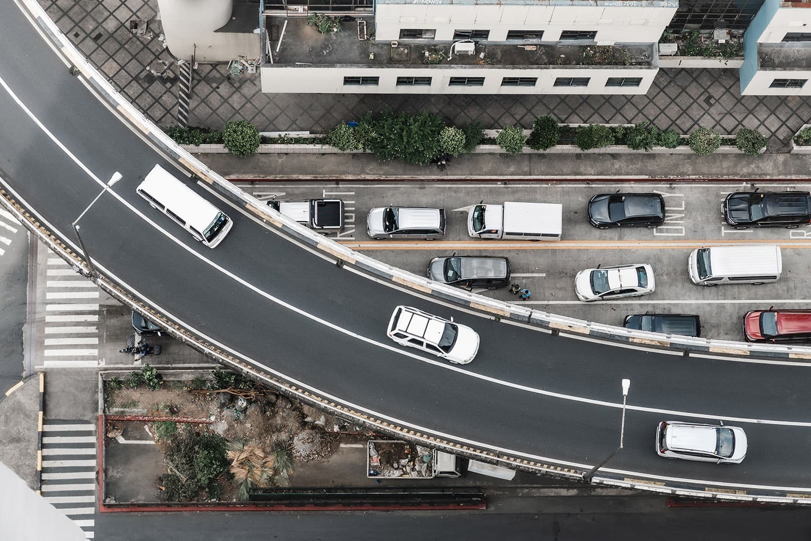 aerial-shot-of-a-a-bridge-over-the-road-in-makati-2025-02-08-00-51-07-utc aerial-shot-of-a-a-bridge-over-the-road-in-makati-2025-02-08-00-51-07-utc