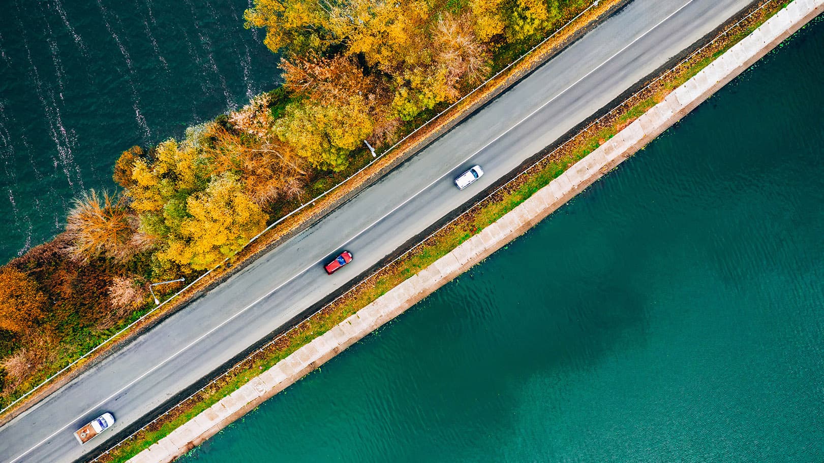 aerial-drone-view-of-asphalt-road-with-cars-over-b-2025-03-18-15-32-15-utc-16-9 aerial-drone-view-of-asphalt-road-with-cars-over-b-2025-03-18-15-32-15-utc-16-9