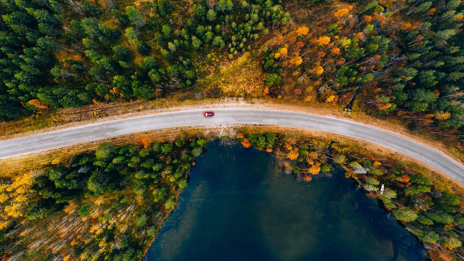 aerial-view-of-rural-road-with-red-car aerial-view-of-rural-road-with-red-car