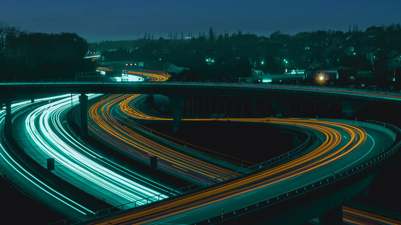 beautiful-view-of-car-trails-on-highways-during-night beautiful-view-of-car-trails-on-highways-during-night