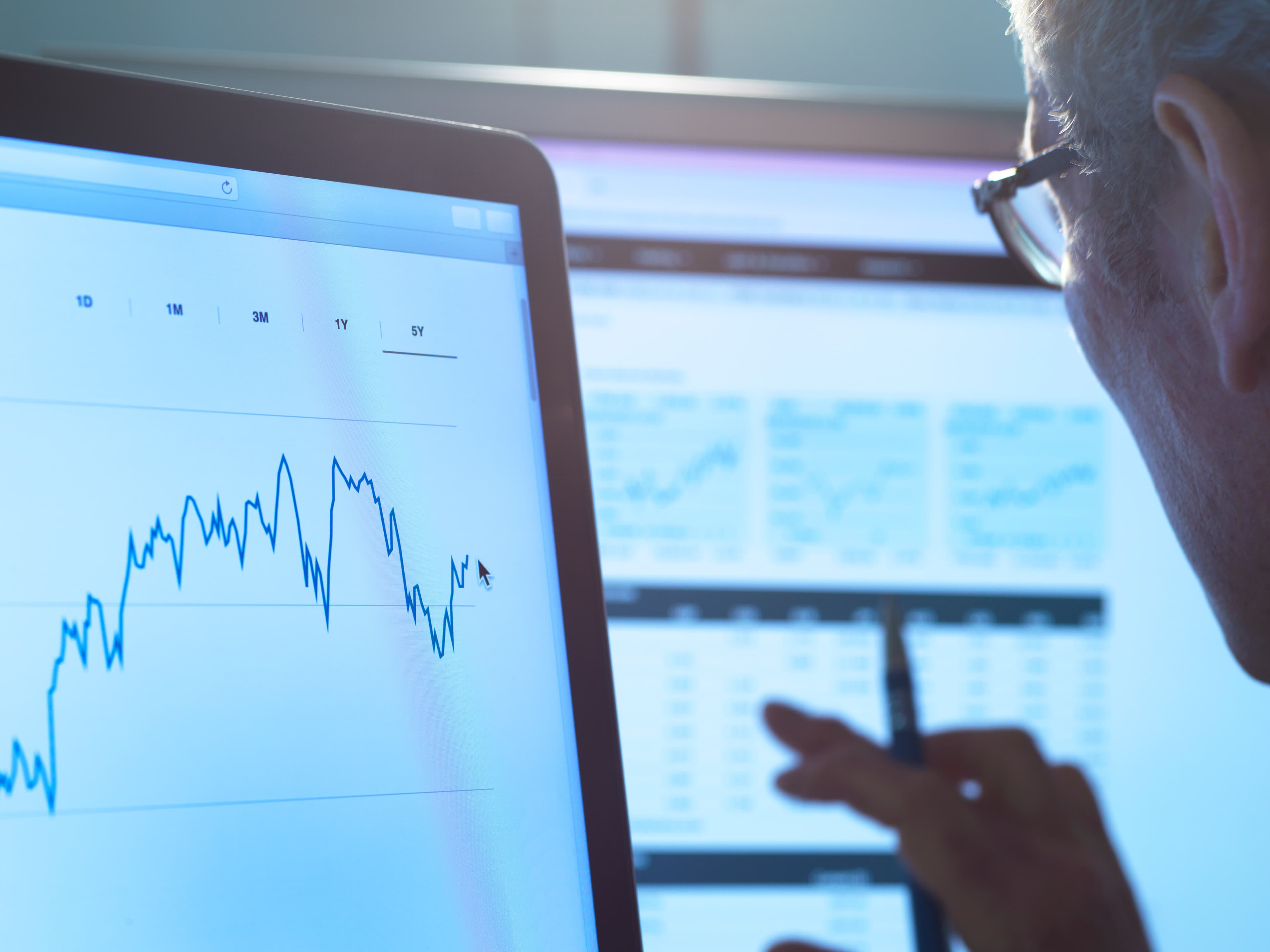 financial-services-stock-analyst-researching-shar-2025-04-04-04-06-31-utc financial-services-stock-analyst-researching-shar-2025-04-04-04-06-31-utc