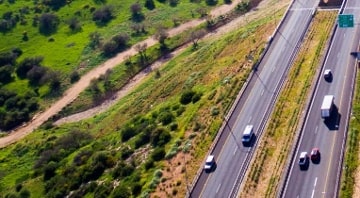 Traffic on road during daytime including fleet drivers
