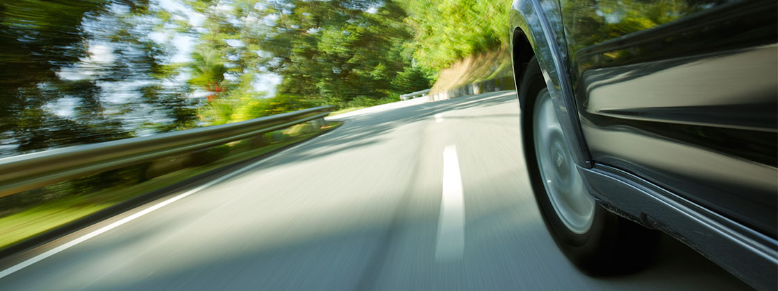 Close up of car tire on road