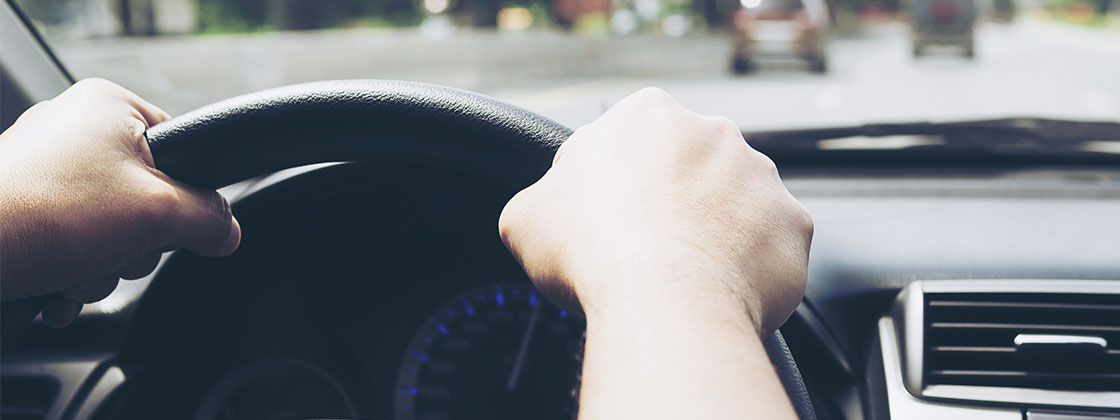 Hands on steering wheel while driving