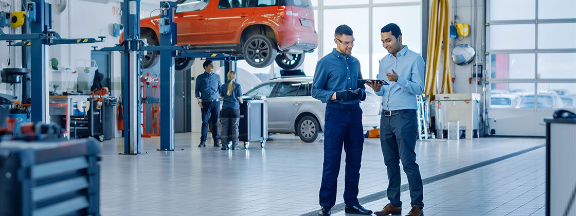 Two men in an auto shop