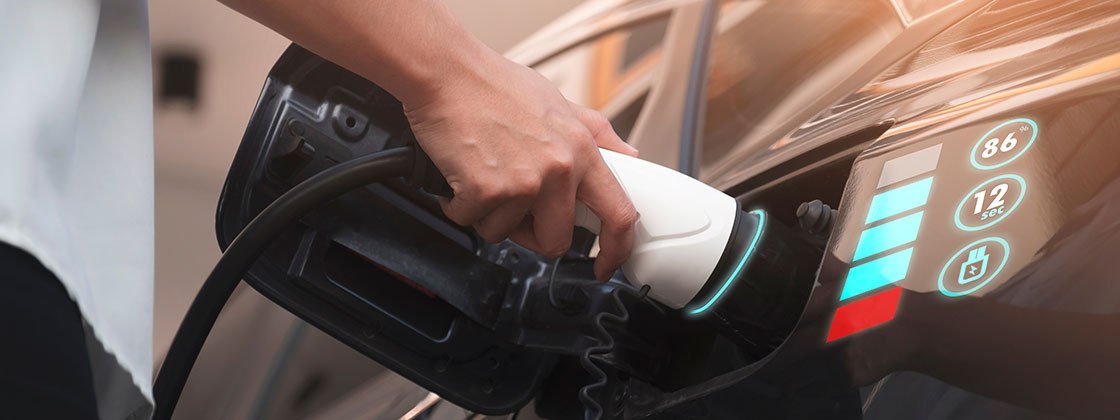 Electric vehicle with plug