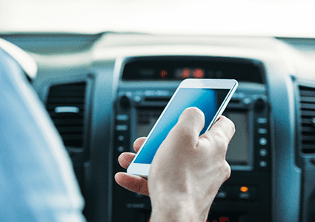 Person in car distracted by phone