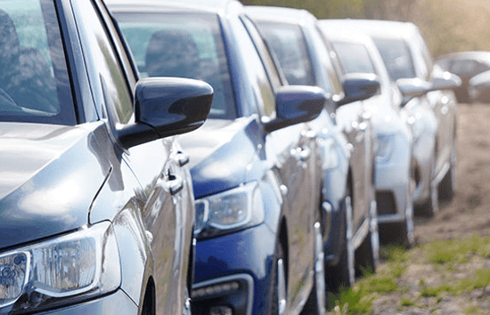 row of cars lined up outside