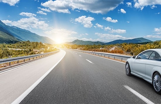 White car on road